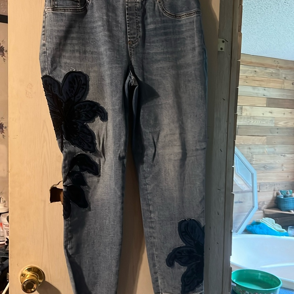 Pull on jeans with embroidered flowers on both legs